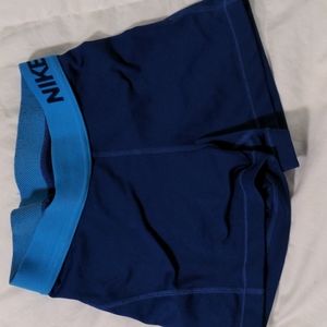 Blue Nike pro shorts
